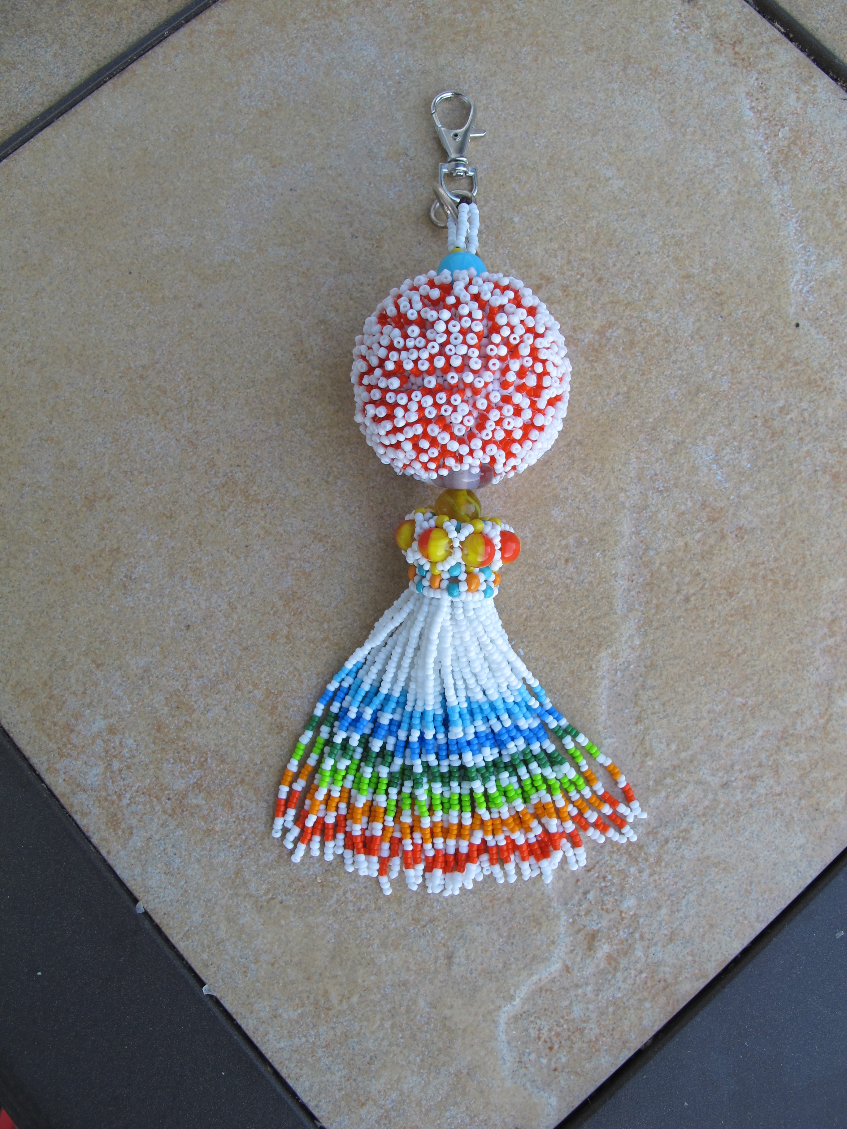 Beaded Bead Keychain in White, Orange and multicolored beaded tassel